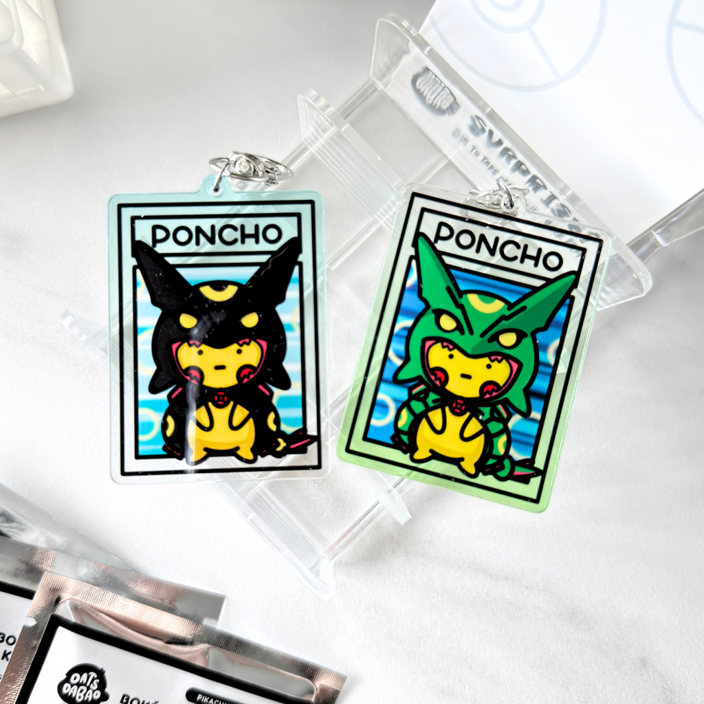 Bokémon TCG Acrylic Keychain - Poncho Wearing Pikachu