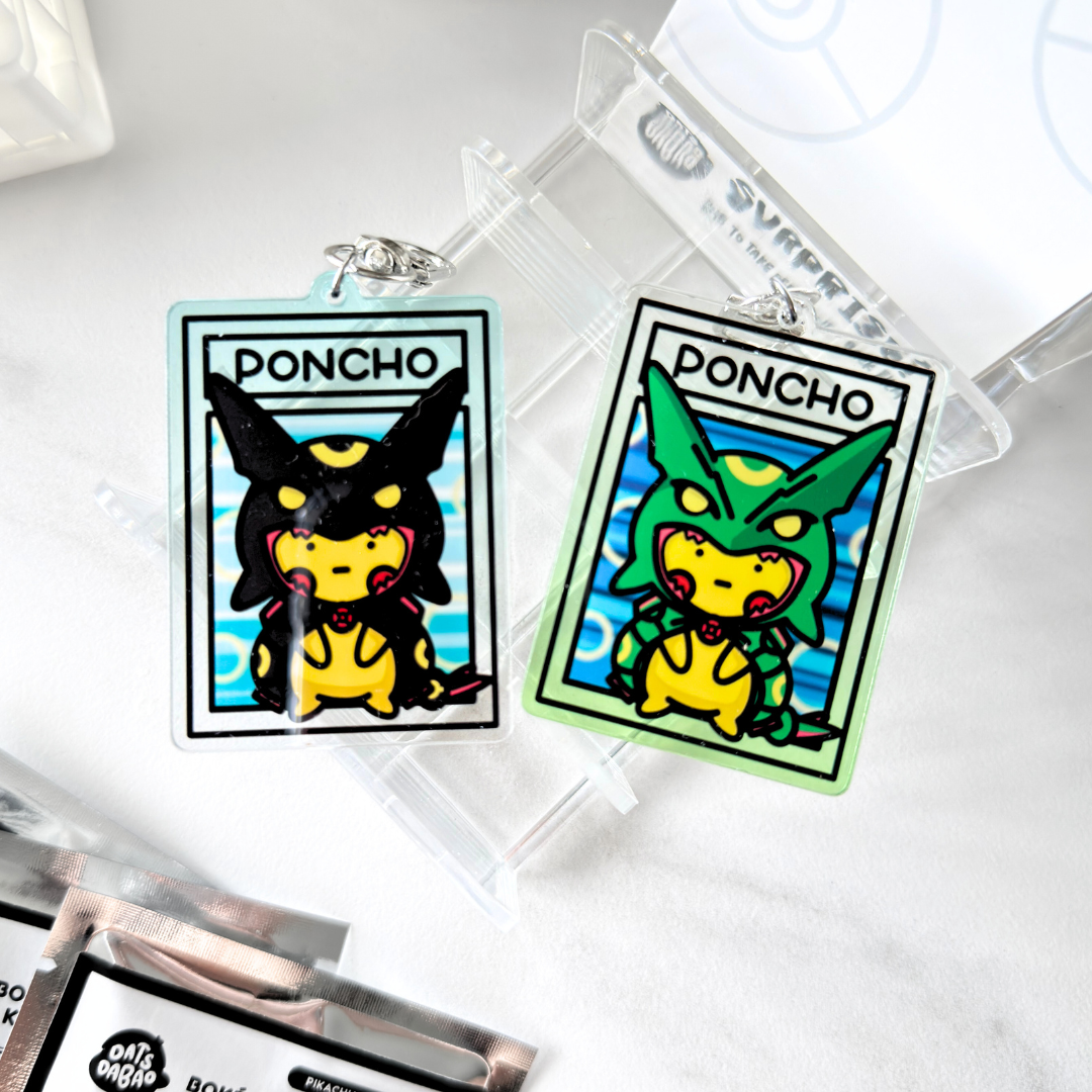 Bokémon TCG Acrylic Keychain - Poncho Wearing Pikachu